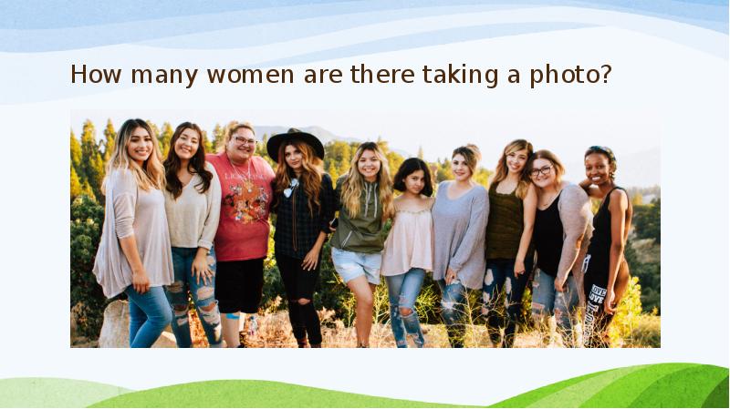 How many women are there taking a photo?