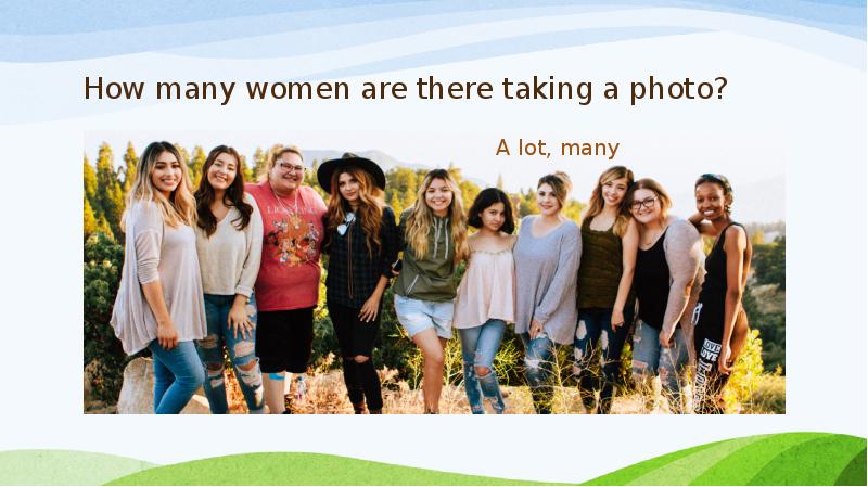 How many women are there taking a photo?